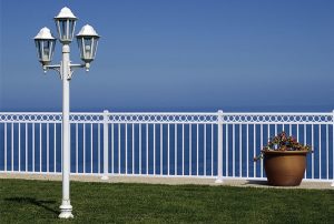 White Westbury Aluminum railing with blue sky in background.