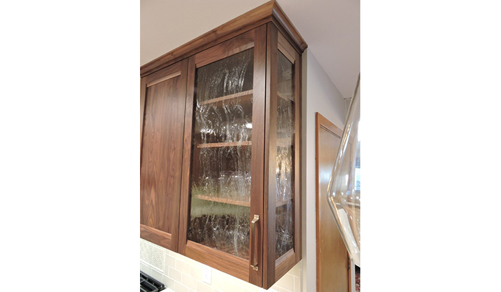 New hardwood cabinet with crinkled glass