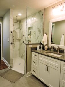 Remodeled bathroom with glass shower