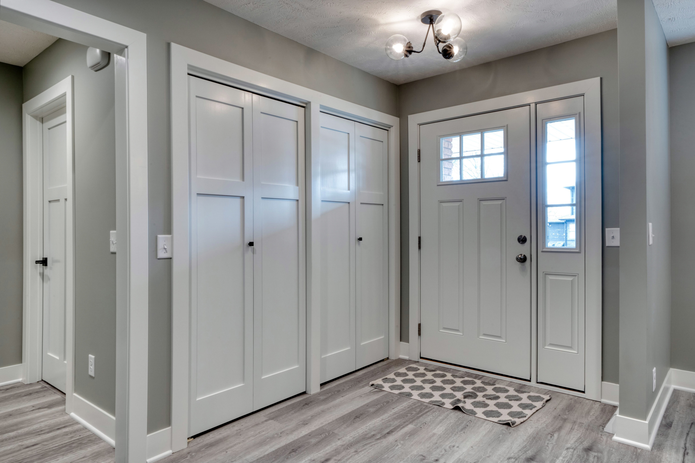 New home entry way with floor to ceiling closets
