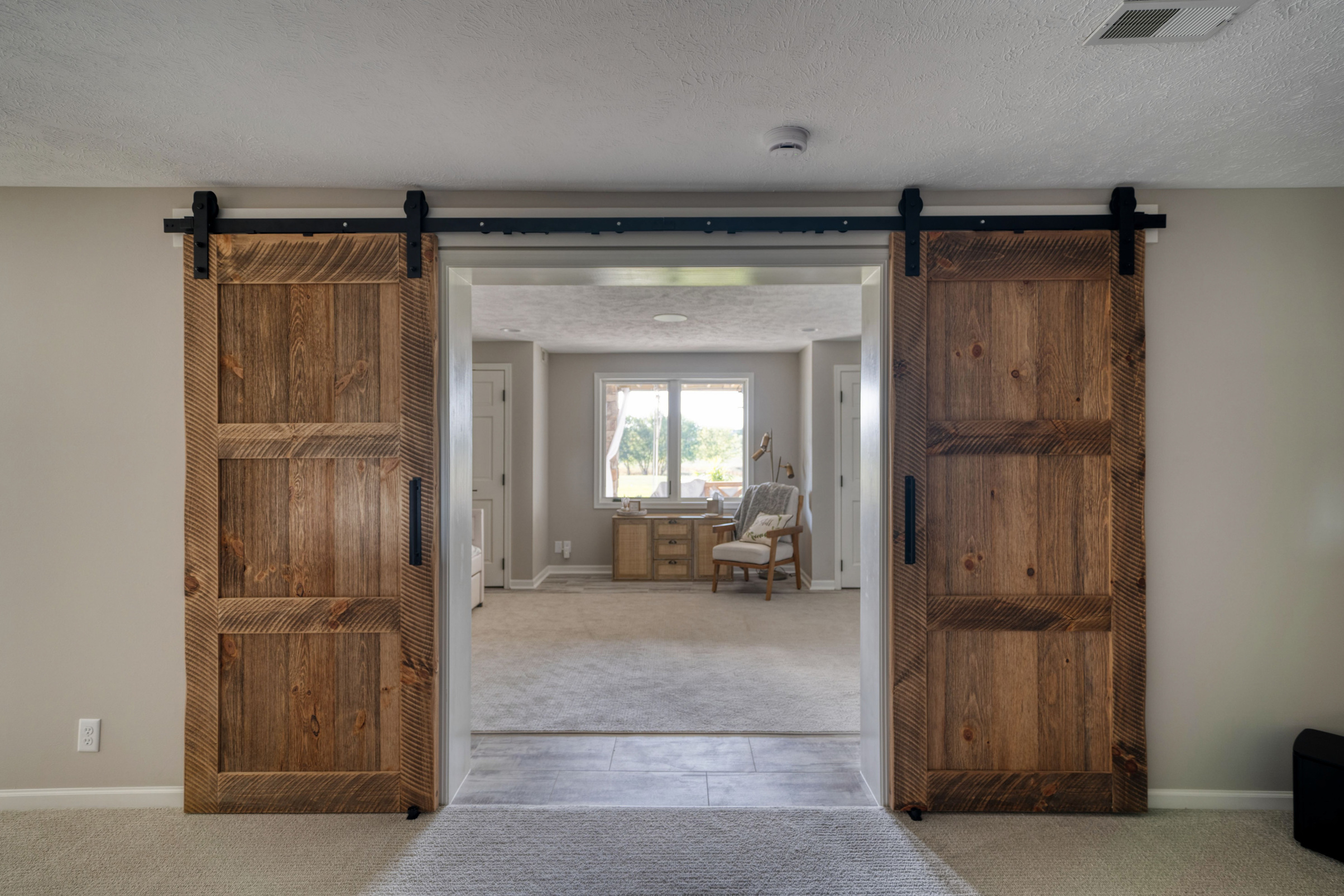 Barn doors that open to a living room