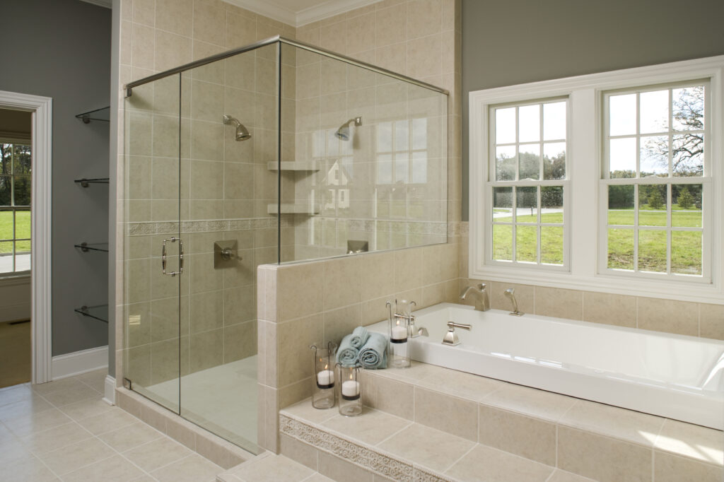 New master bathroom suite with tiled tub and walk in shower.